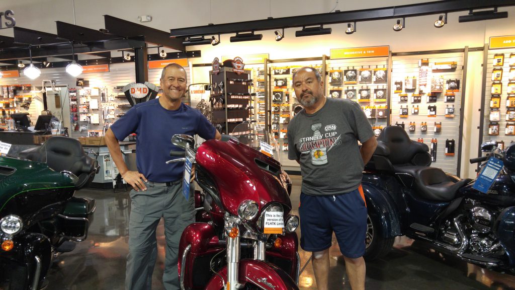 Mike (on the right) and I at the Harley Dealer